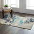 2' X 4' Ivory And Teal Blue Abstract Power Loom Non Skid Area Rug